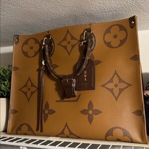 Authentic Louis Vuitton OTG GM in Reverse Monogram